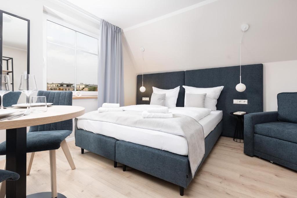 Apartments in der Kurgartenstraße Altstadt Travemünde | Theska Hoteleinrichtung | Hotelzimmer | Raumkonzept | Designer Einrichtung